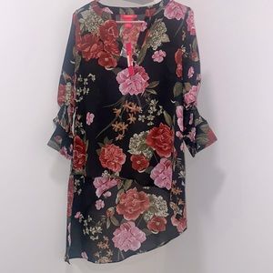 Nordstrom Rack black asymmetrical shirt with pink flowers. Never worn before.